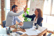 Man and woman discussing digital marketing packages for small businesses