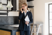 Real estate agent speaking on the phone