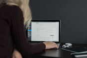 Woman typing on computer