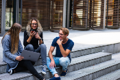 marketing team discussing Marketing Workflow Software