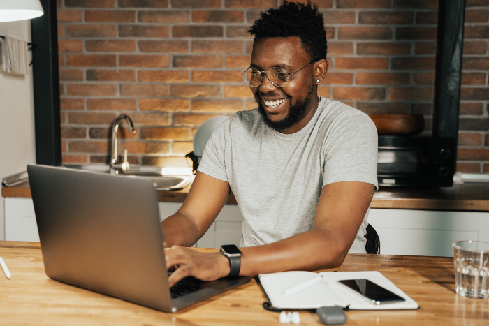 Man planning SaaS Customer Journey on Laptop - 700w