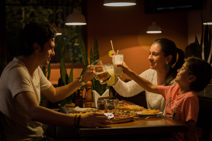 family enjoying meal at a restaurant