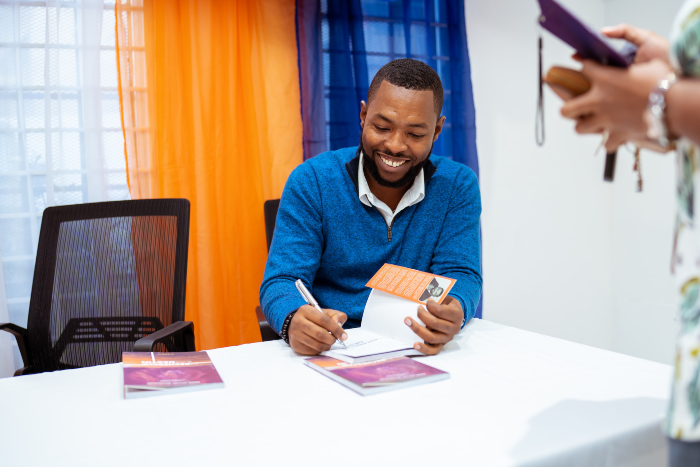 Author Autographing while marketing self published books