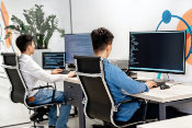 two men using computers