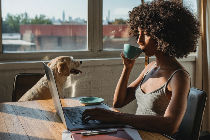 Woman researching about Marketing SaaS Companies  on Laptop