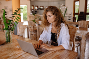 woman looking at reviews from Restaurant Marketing Companies