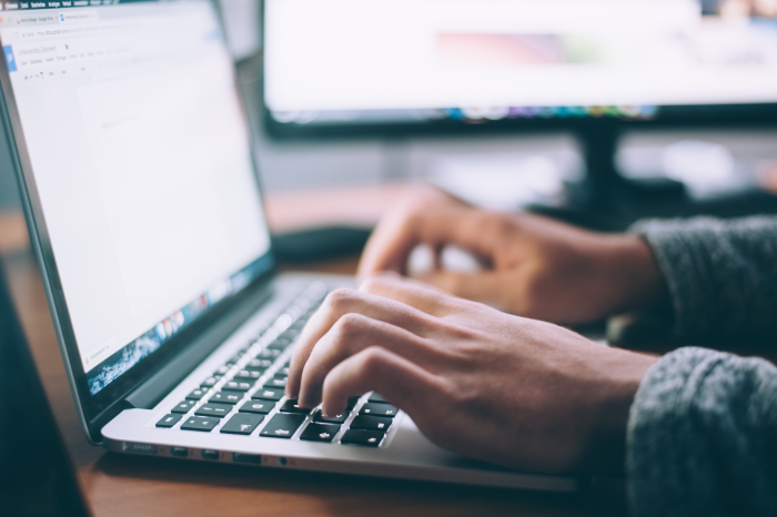 Typing for SaaS email marketing on computer