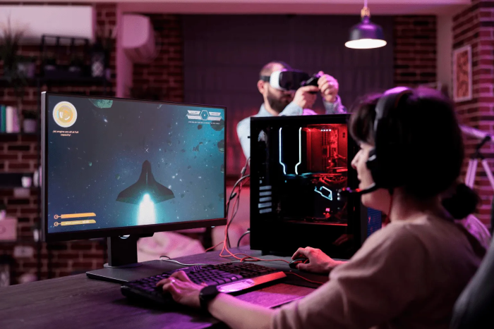 Girl playing a game on a PC 