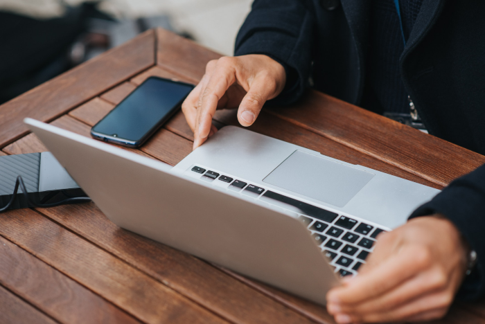 Man holding laptop