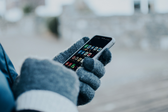 woman holding phone