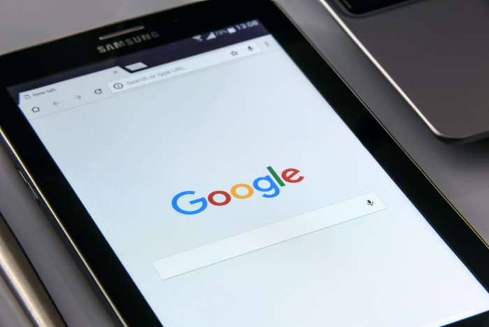 An image of an iPad with Google on the screen to demonstrate automated SEO software