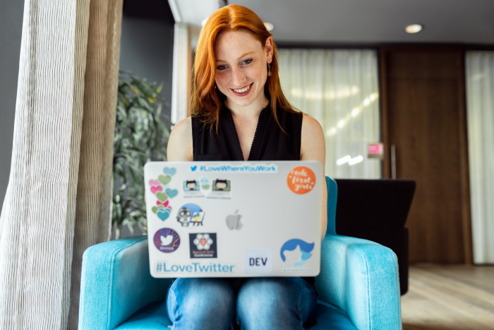 lady reading SaaS customer retention strategies on Laptop