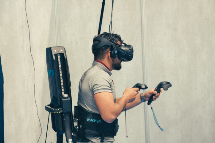 Man playing virtual sports, showcasing sports marketing trends