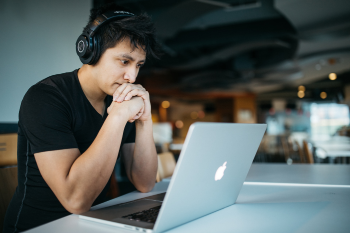 Person using ad tracking software on Laptop
